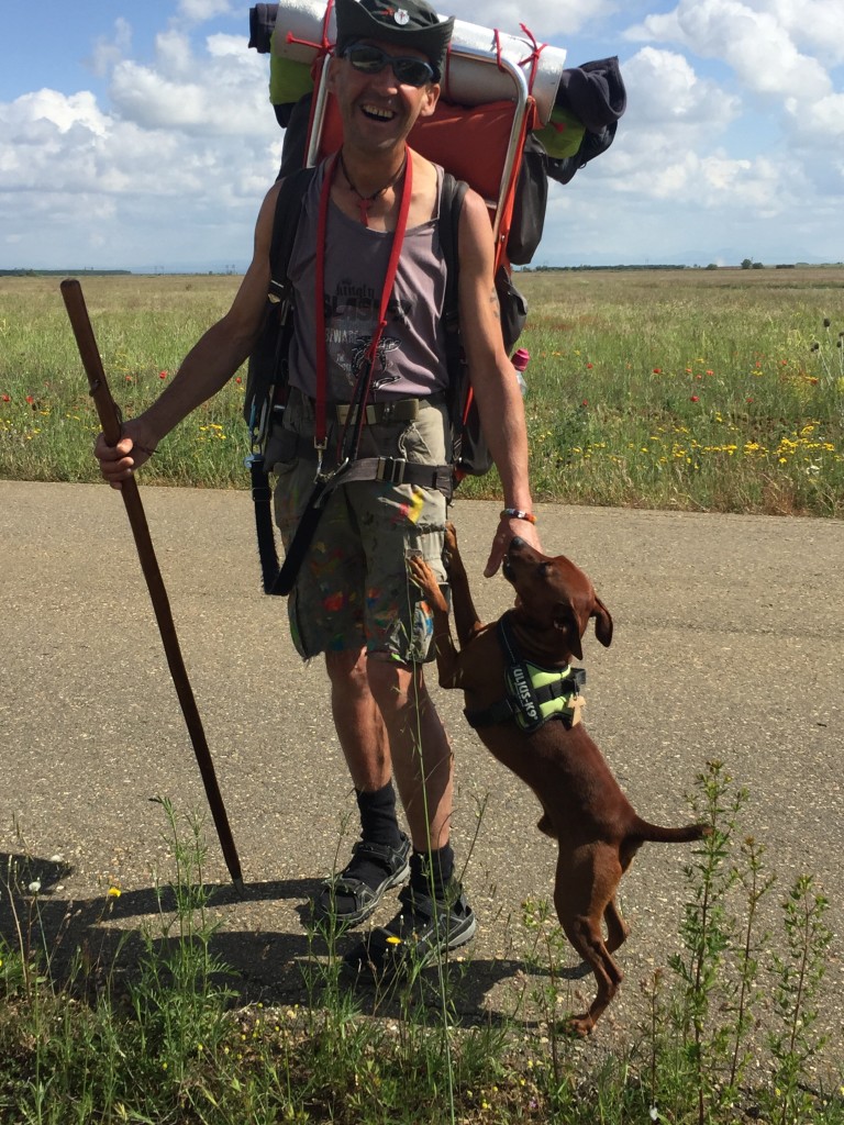 pilgrim with his dog, Falcon, Day 21 - Bercianos Del Real Camino to Mansilla de las Mulas | Camino de Santiago